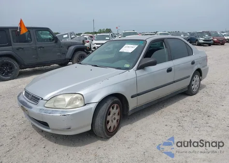 1999 Honda Civic Lx from USA, damaged, VIN 1HGEJ6677XL015230